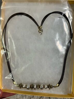 Silpada Necklace — Leather, gold, and silver